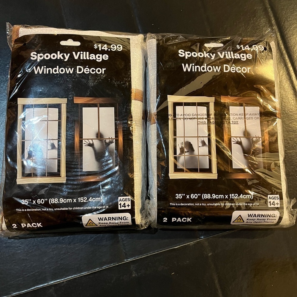 Spooky Village Window Decor 2 Packs of 2 (4Total) Size 35” x 60”. Trapped. NWT.